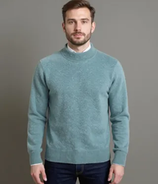Man wearing the sage mock-neck wool sweater over a white shirt, front view